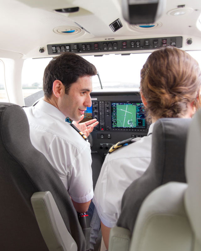 Students insdie a cockpit